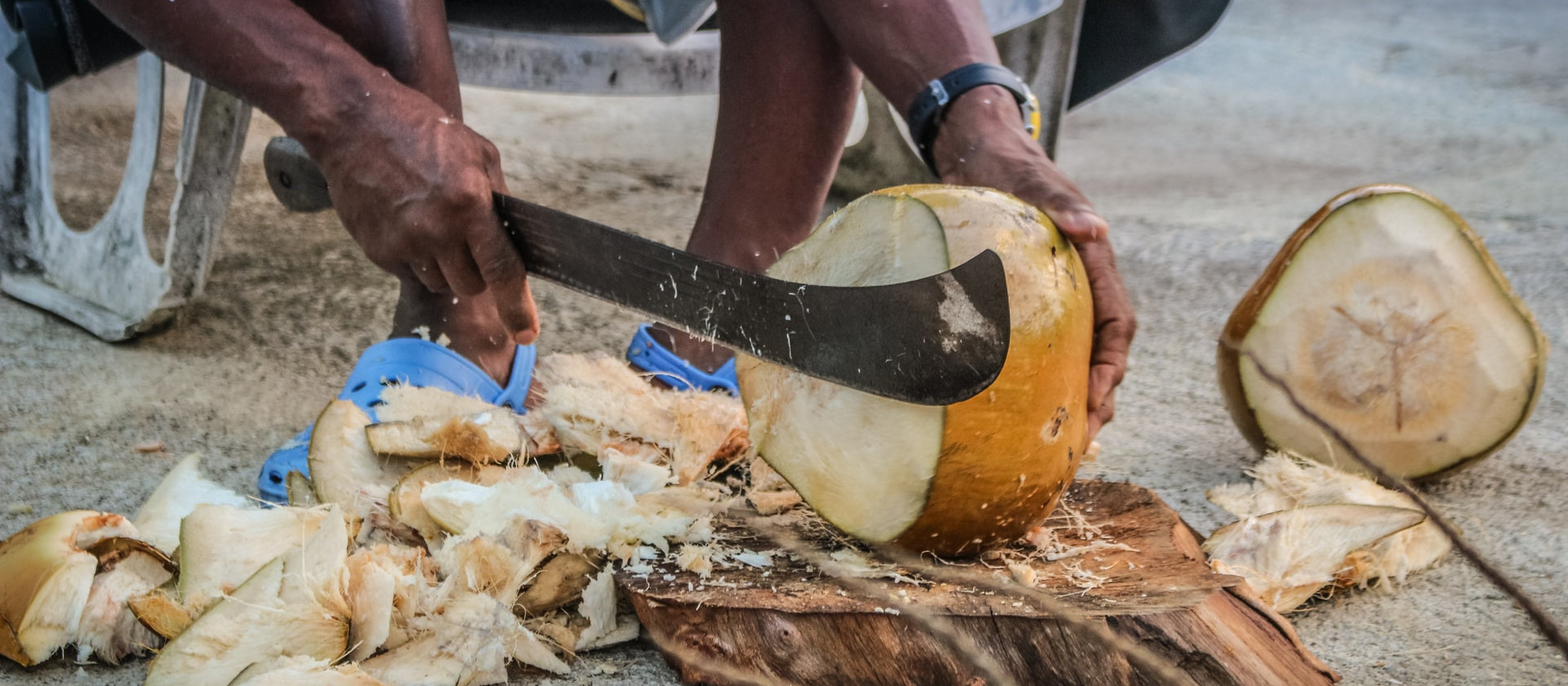 Man chopping a coconut