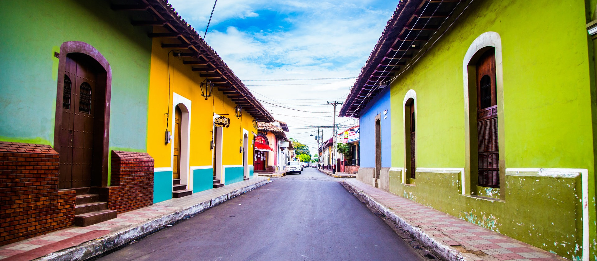 Colourful houses line a street in León Department, Nicaragua
